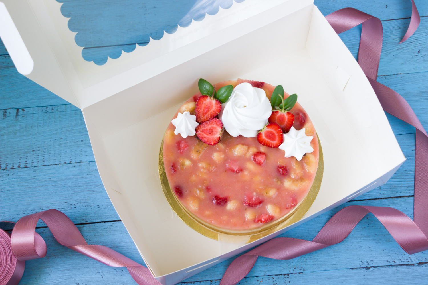 strawberry cake in a food packaging box