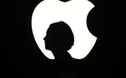 Silhouette of a head on an apple logo